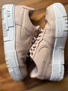 Nike Women’s Low-Top Sneakers in Blush Pink and White